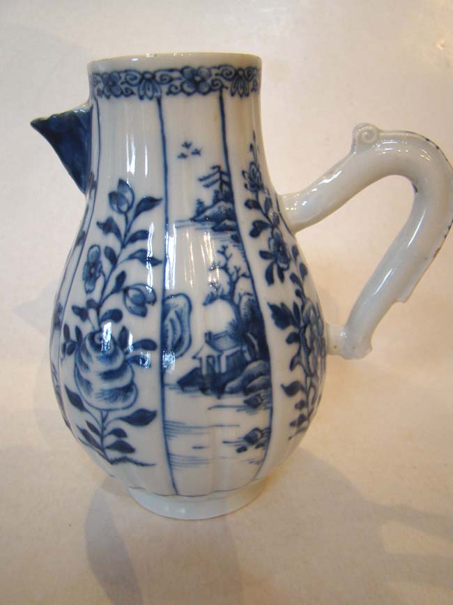 An attractive 18th century fluted baluster form Chinese Export Porcelain cream jug